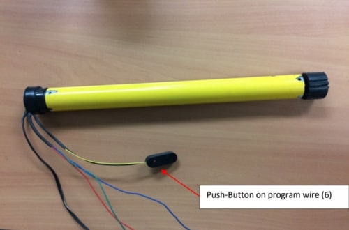 Botón pulsador en el cable del programa